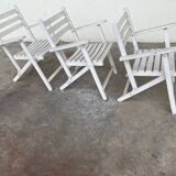 Folding wooden armchairs