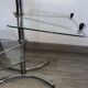 Four-tier rotating shelf in chrome metal