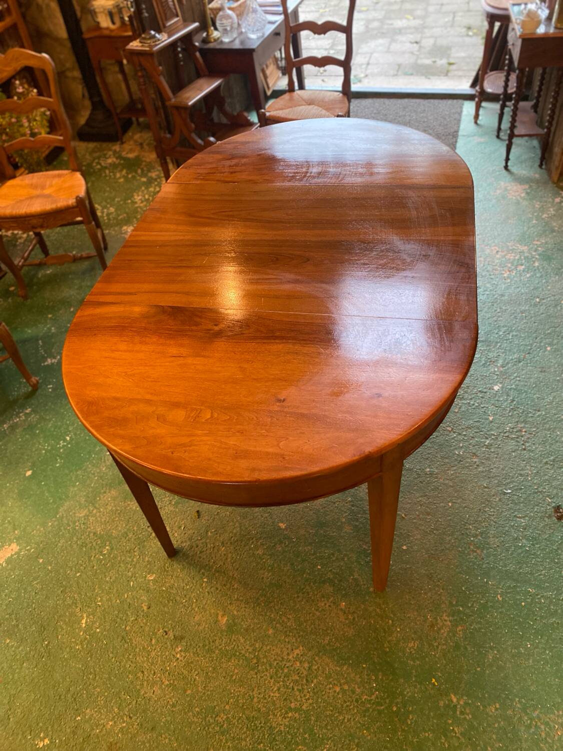 Louis XVI style oval walnut extendable table
