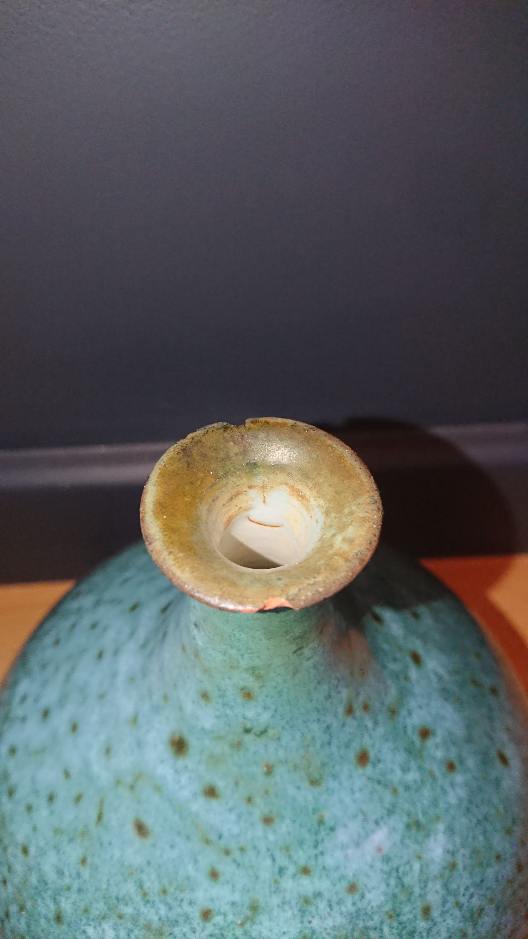 Signed turquoise blue ceramic soliflore vase