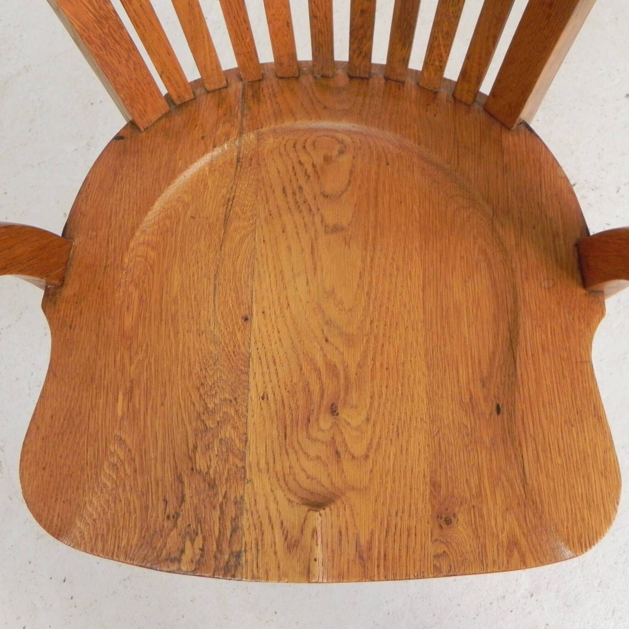 Oak office chair with adjustable spring system and height adjustment, 1950s.