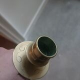 Pair of chiselled candlesticks