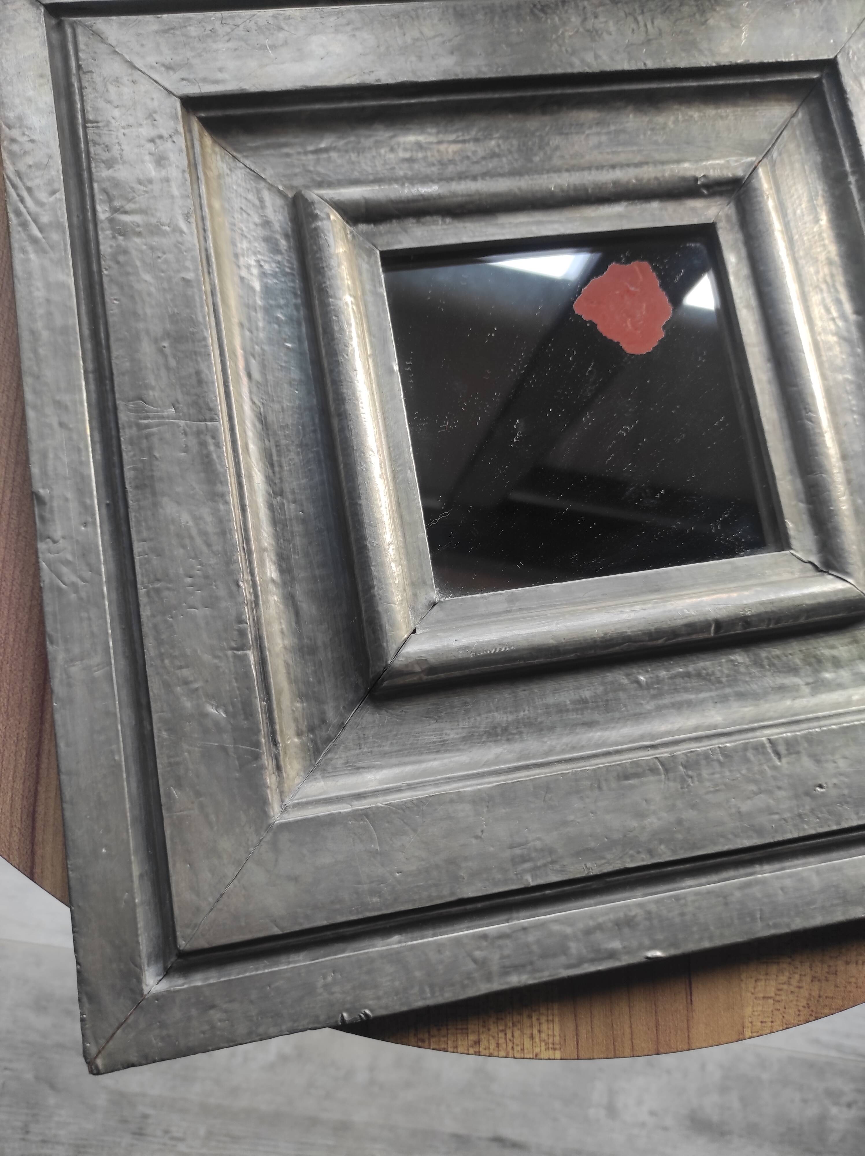 Vintage square mirror in wood covered with metal leaf, moldings in relief