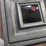 Vintage square mirror in wood covered with metal leaf, moldings in relief