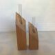 Pair of diamond-shaped wooden Scandinavian test tube vases.