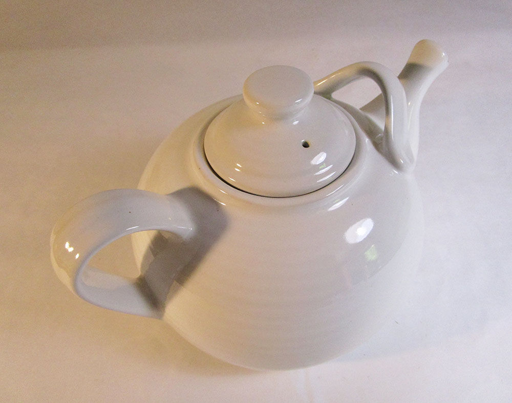 Large white ceramic teapot