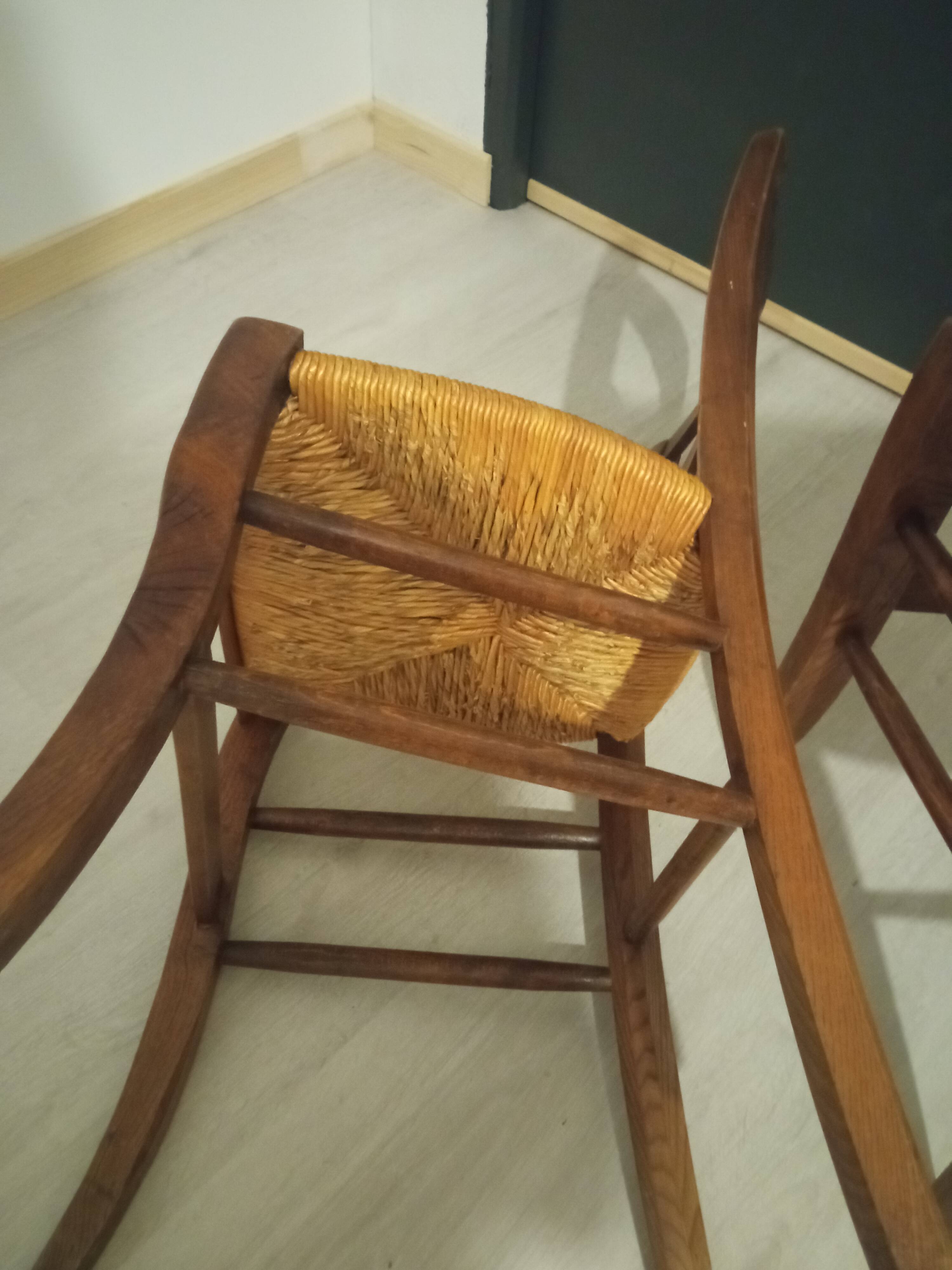 Pair of vintage wooden and woven straw chairs