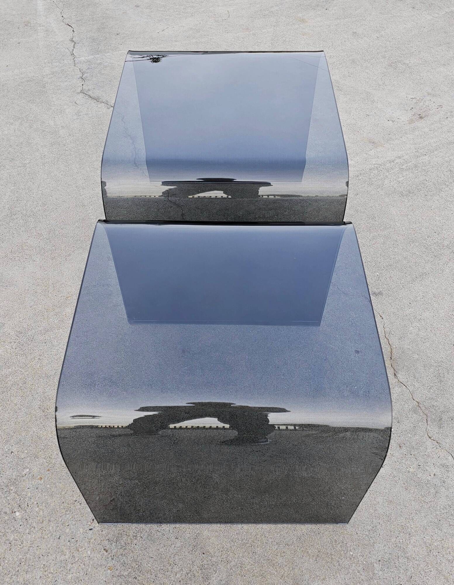 Pair of Waterfall nesting tables in tinted glass attributed to FIAM 1980s.