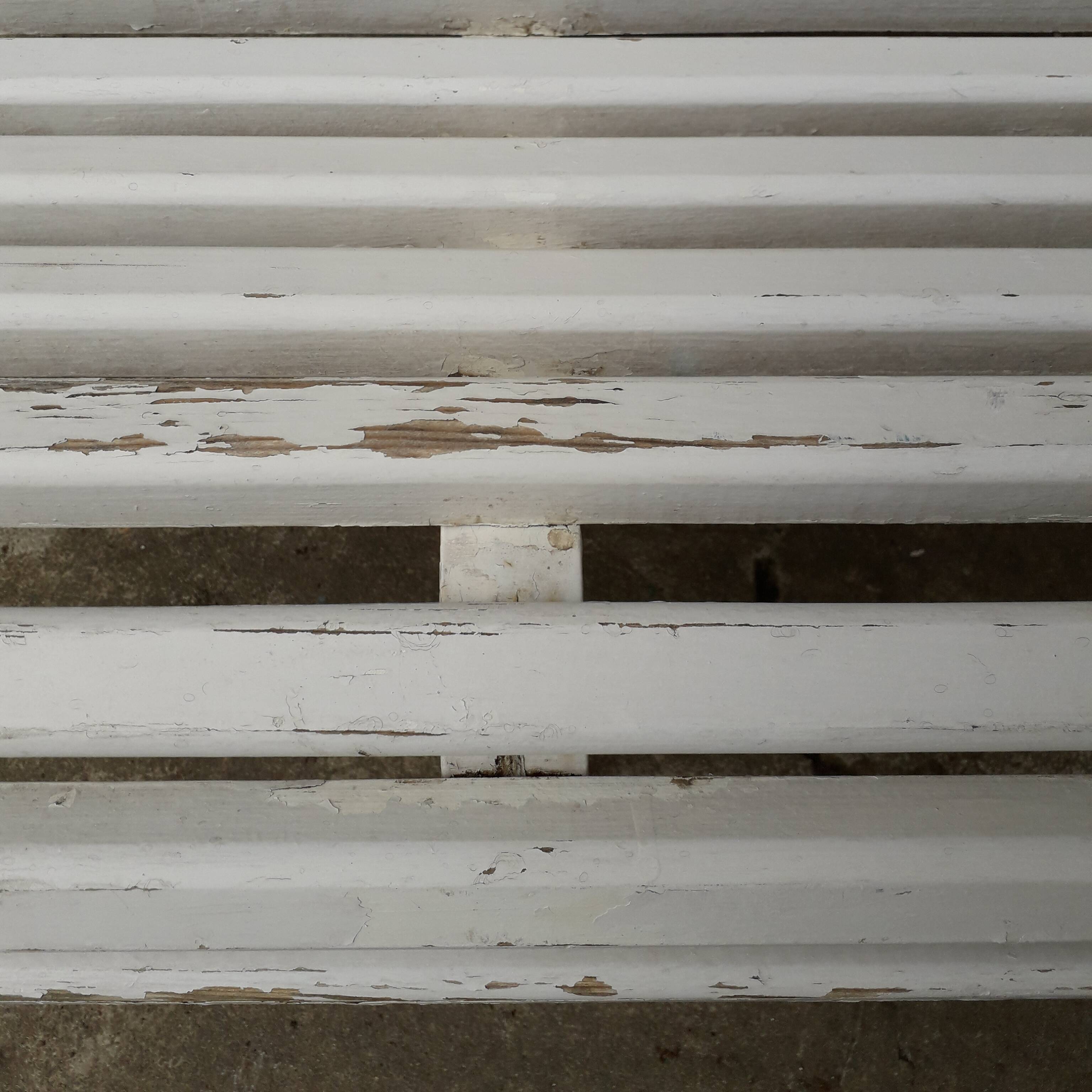 White garden slat bench
