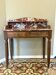 Art Deco console in walnut and marble.