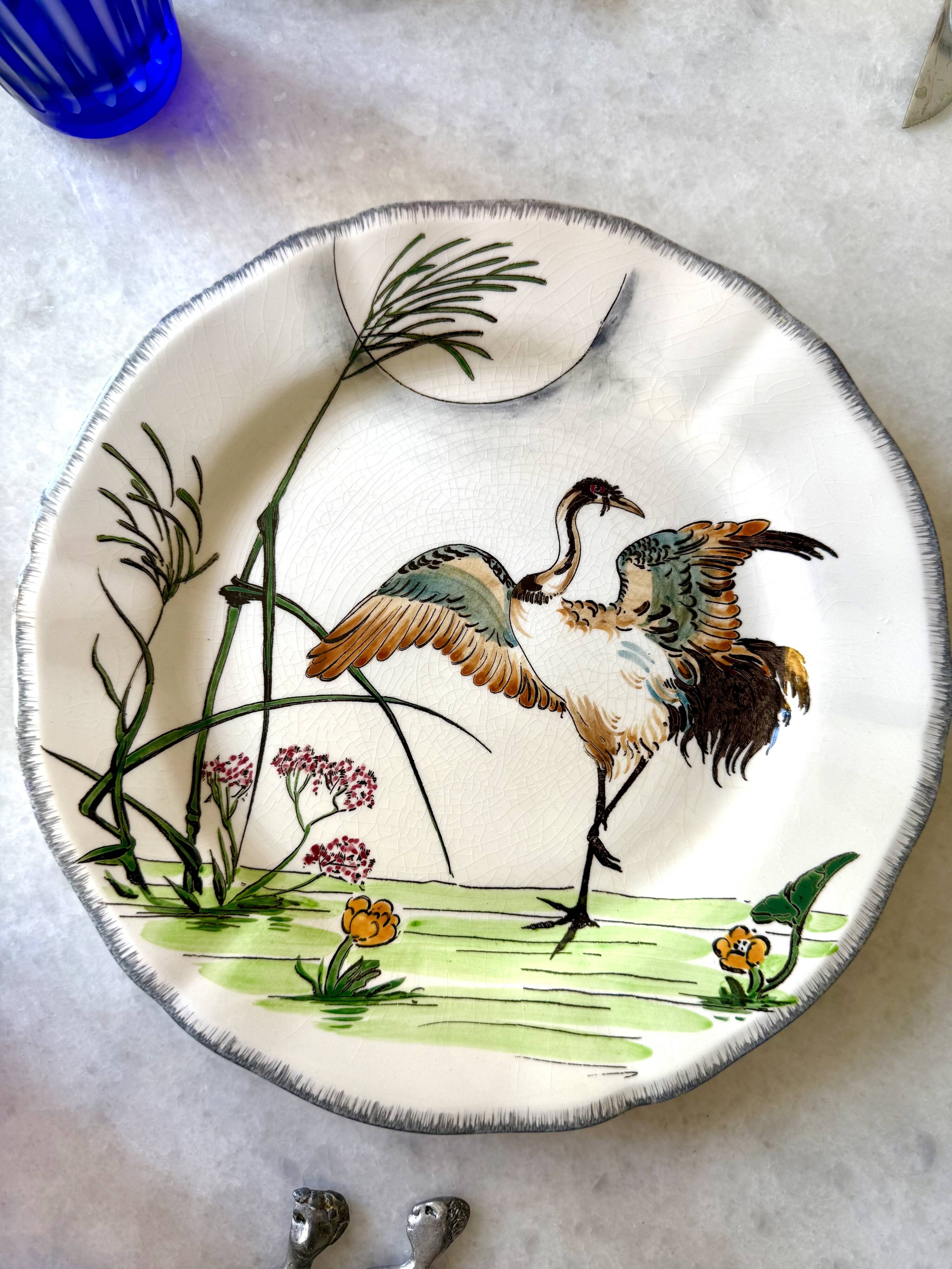 Service de table assiettes et plats Gien modèle grands oiseaux
