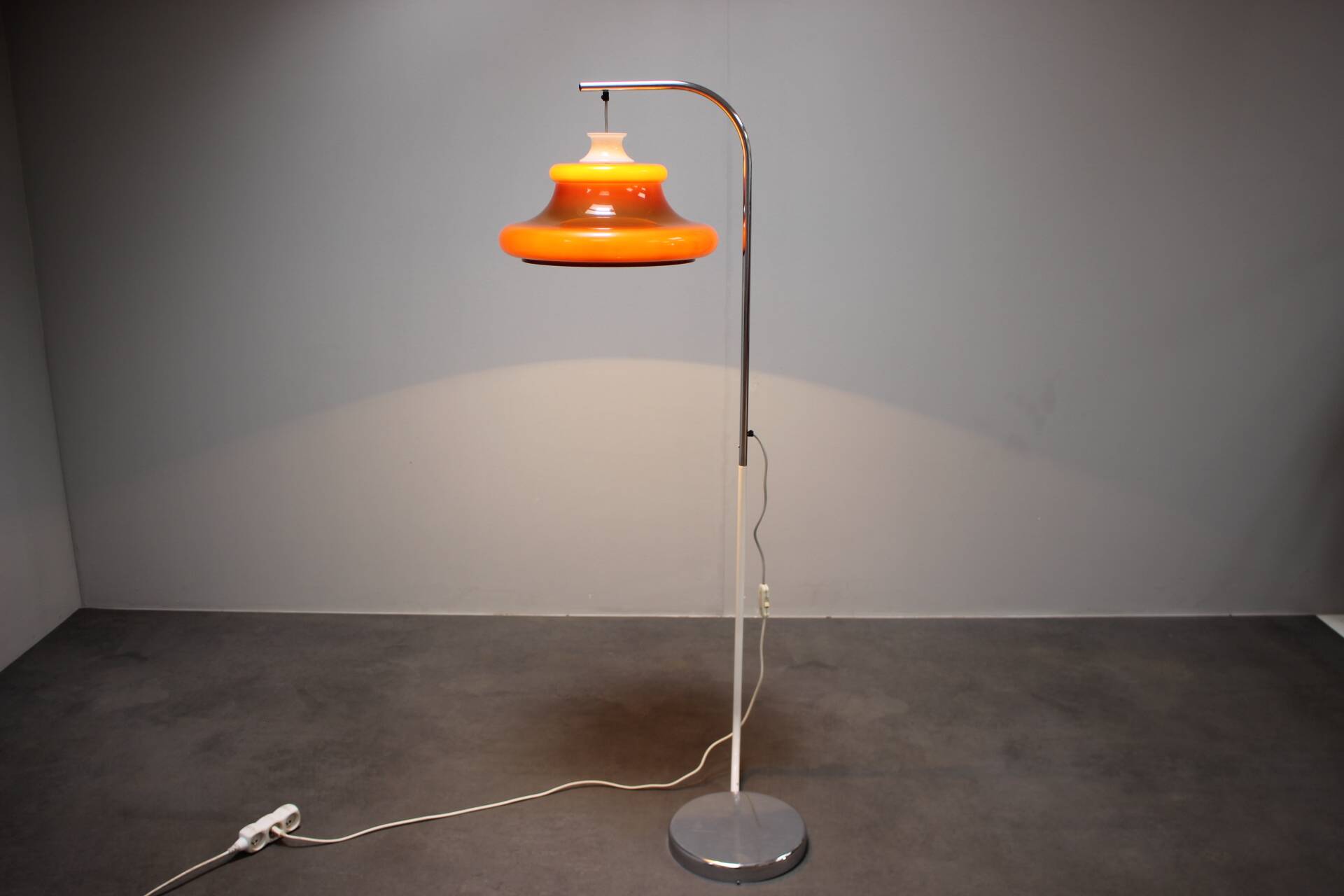 1970s Hungarian space age floor lamp in orange plastic and chrome.