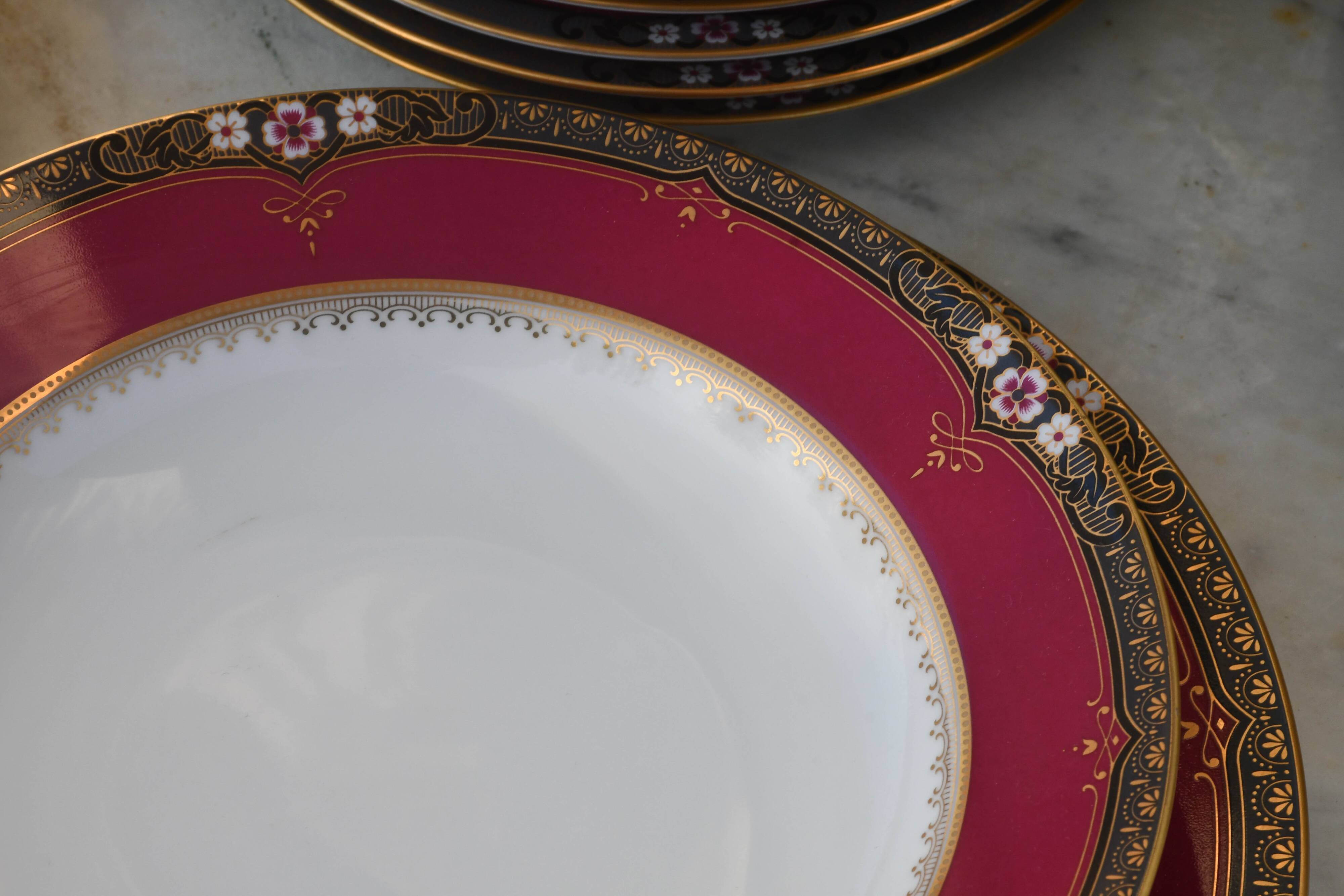 Elegant mid-century Japanese bone china service for 12 in white and noble red
