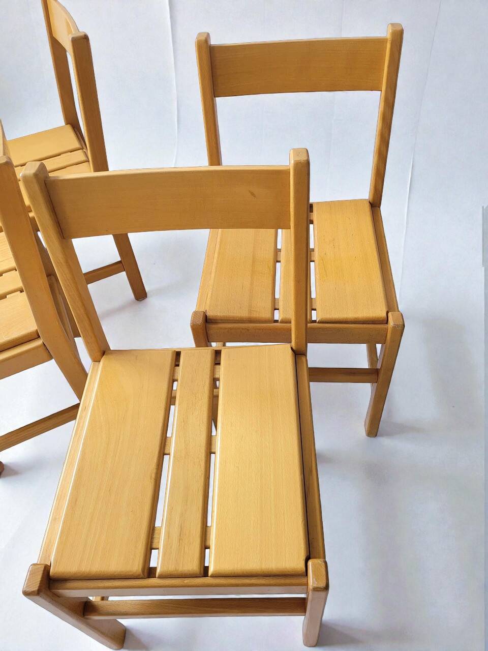4 cheises en bois style Charlotte perriand