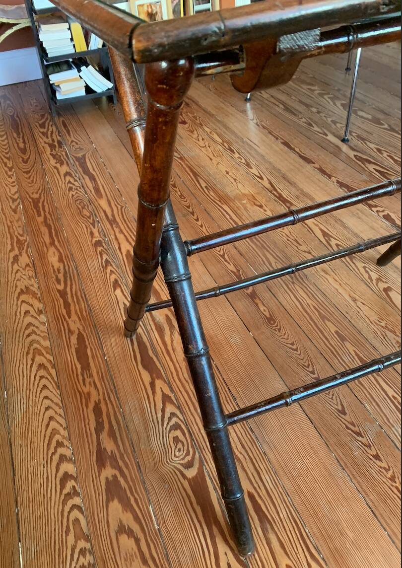 Folding mahogany table with a mirror top.