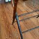 Folding mahogany table with a mirror top.