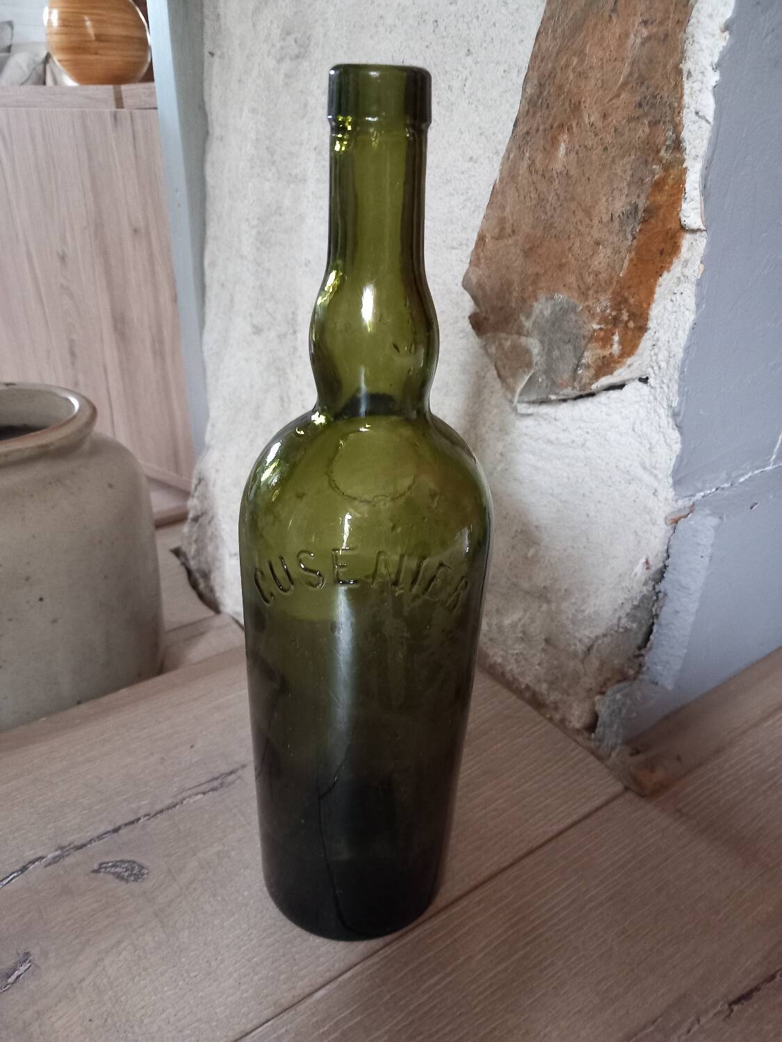 Old thick glass bottle