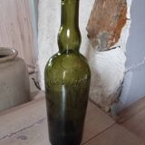 Bouteille ancienne en verre épais