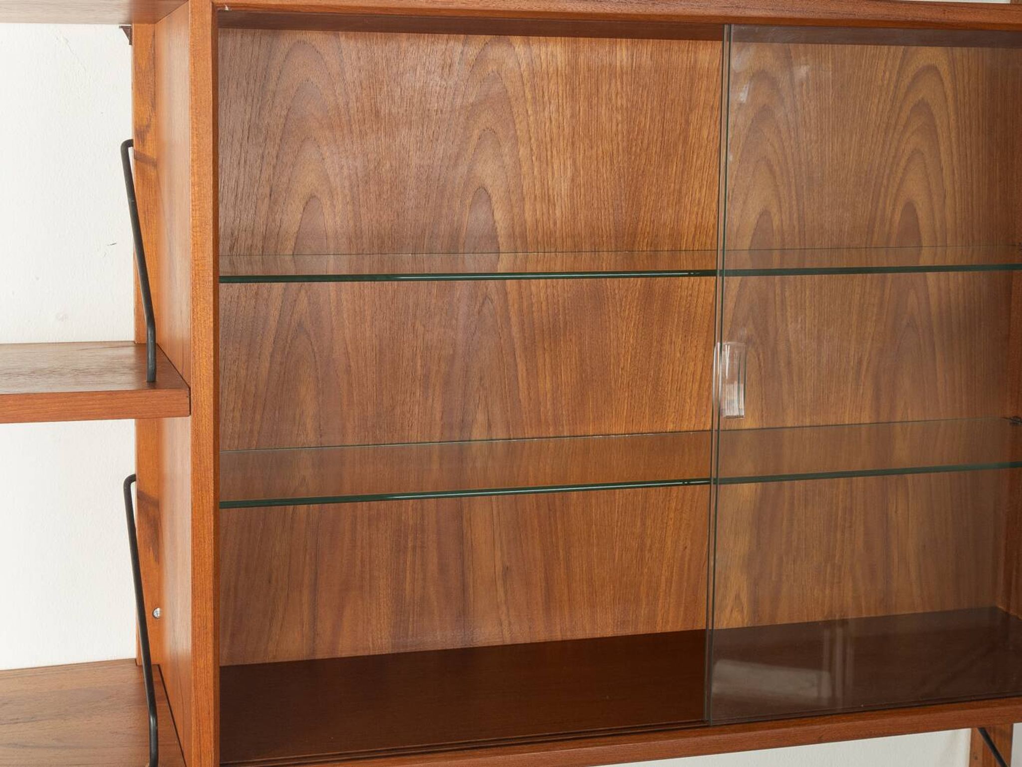 Classic shelving system from the 1960s in teak veneer by Poul Cadovius for Cado