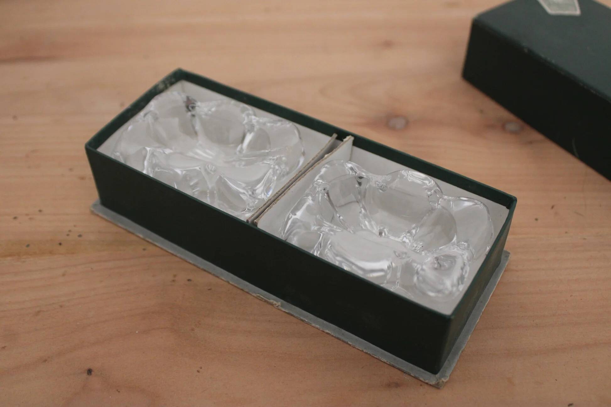 Pair of crystal salt cellars from Daum France with box and spoon.