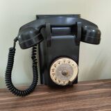 Old bakelite wall telephone