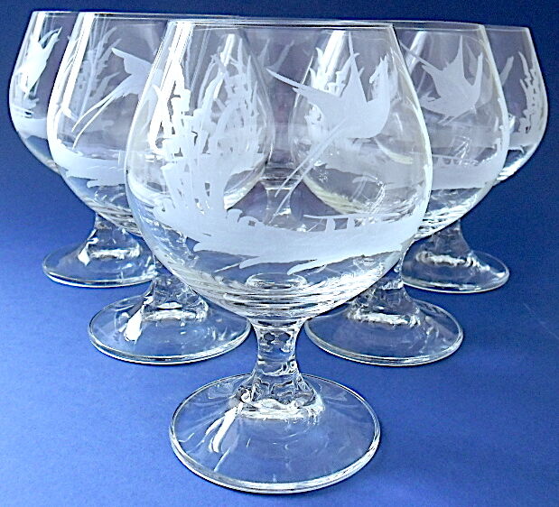 Suite of six tasting glasses of engraved crystal cognac