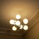 Mid century chandelier with 9 radiating milk glass globes 1970s