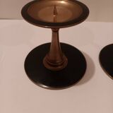 Pair of black brass candlesticks