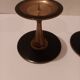 Pair of black brass candlesticks