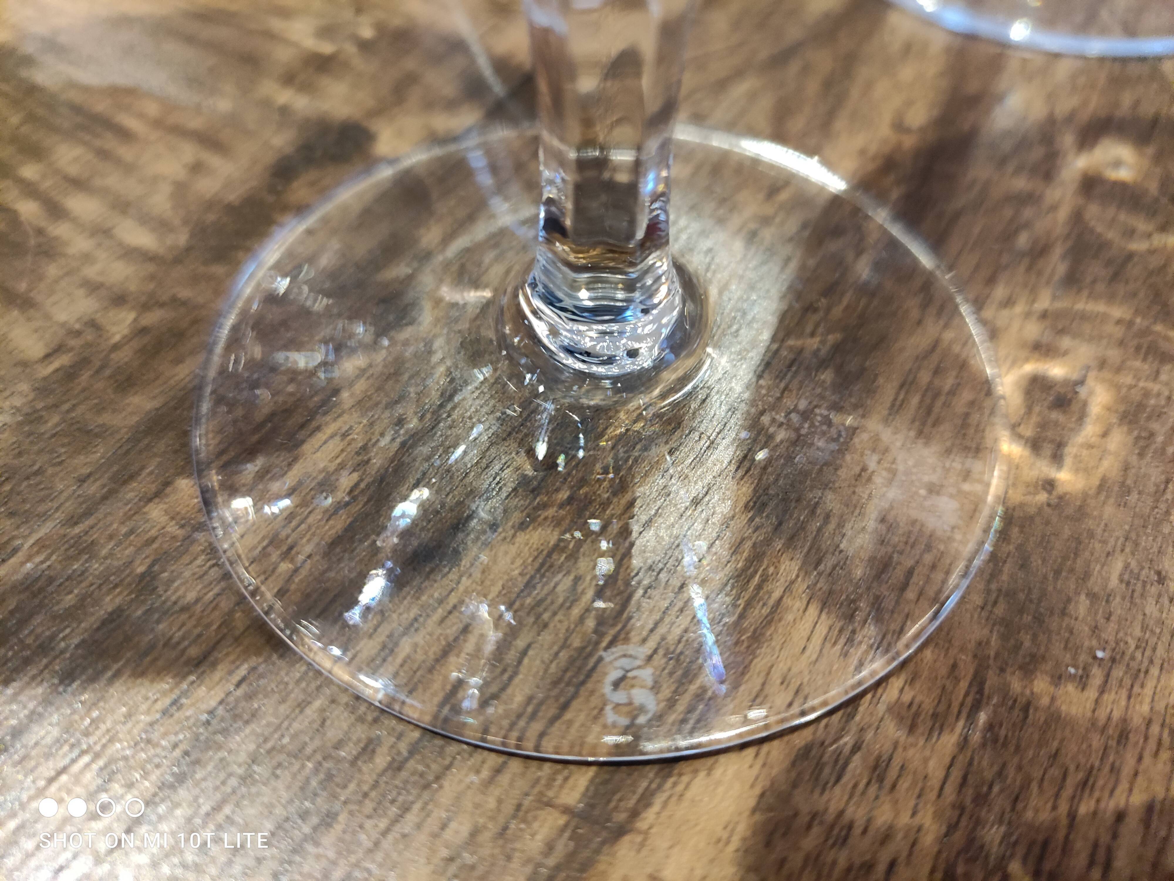 Set of 7 chiseled crystal wine glasses stamped with a crowned S