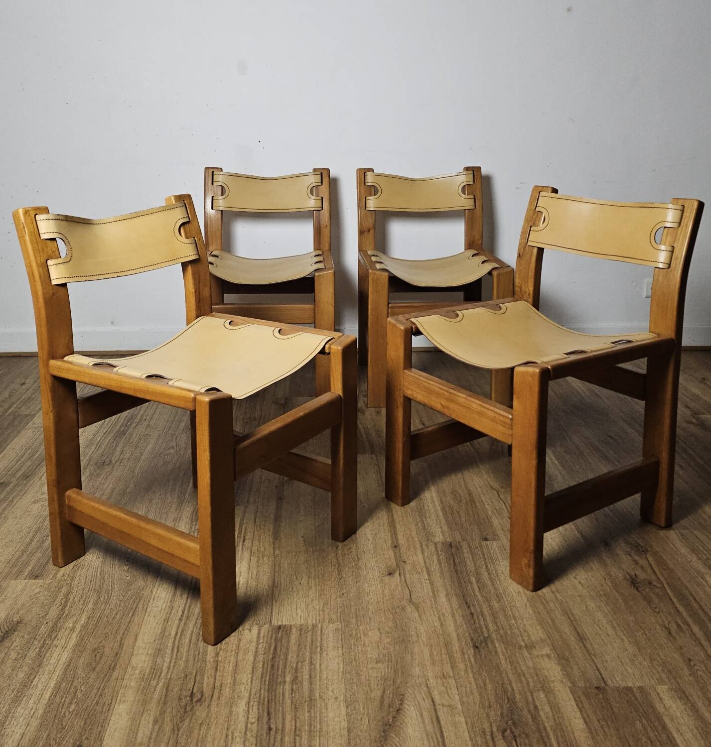Solid Elm and cream leather chairs, Maison Regain, 1960s.