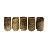 Series of five cups in sandstone