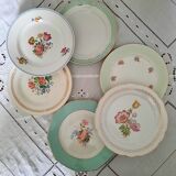 Pitted old flat earthenware plates with gold