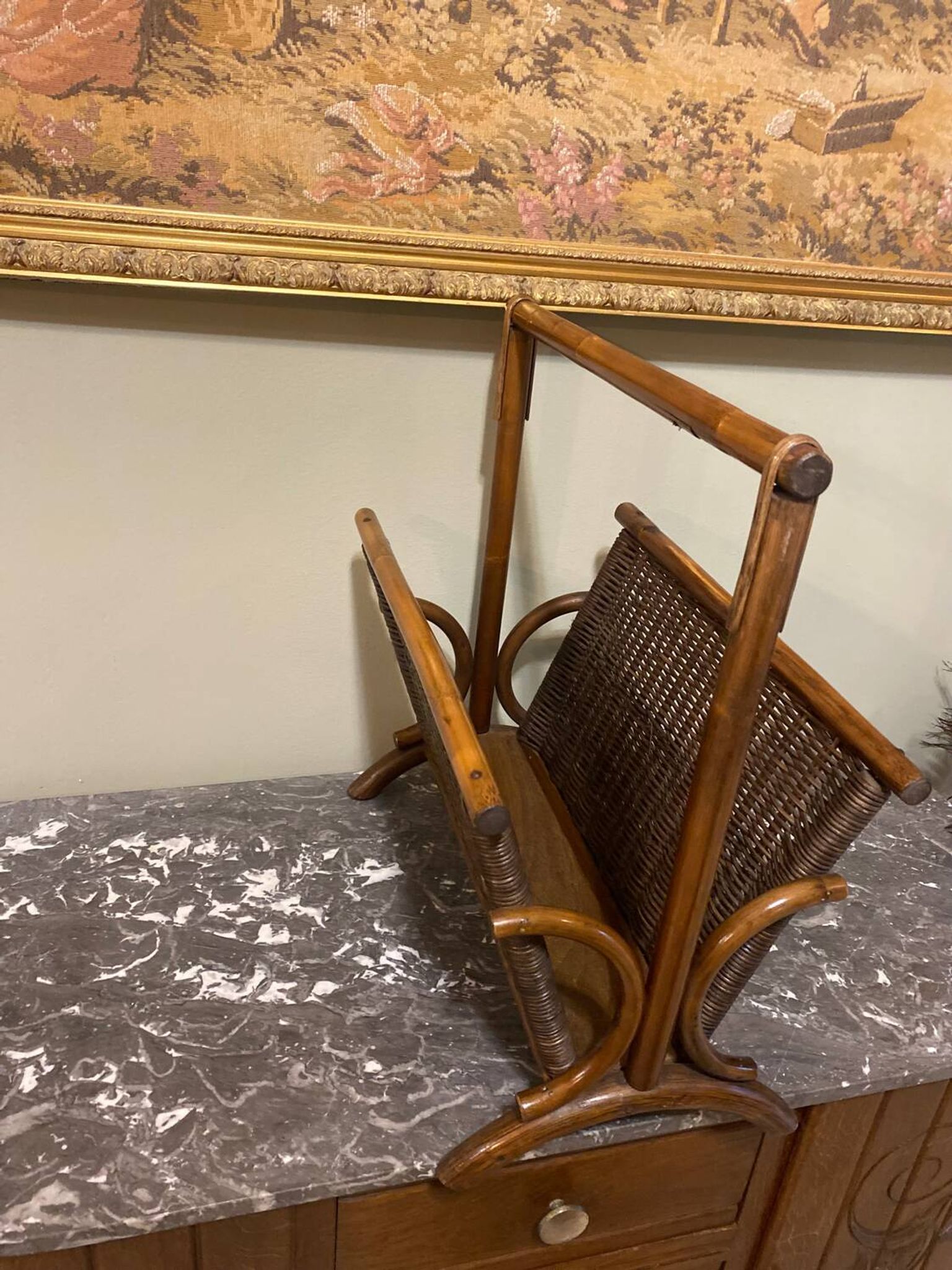 Wicker and brown wood magazine rack