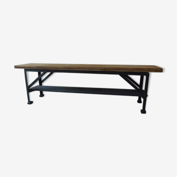 Bench style indus metal structure, seat and wooden shelf.