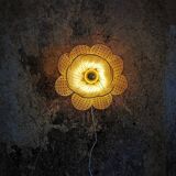 Flower wall light made of rattan petals and nude embroidery