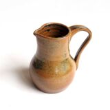 Glazed stoneware pitcher