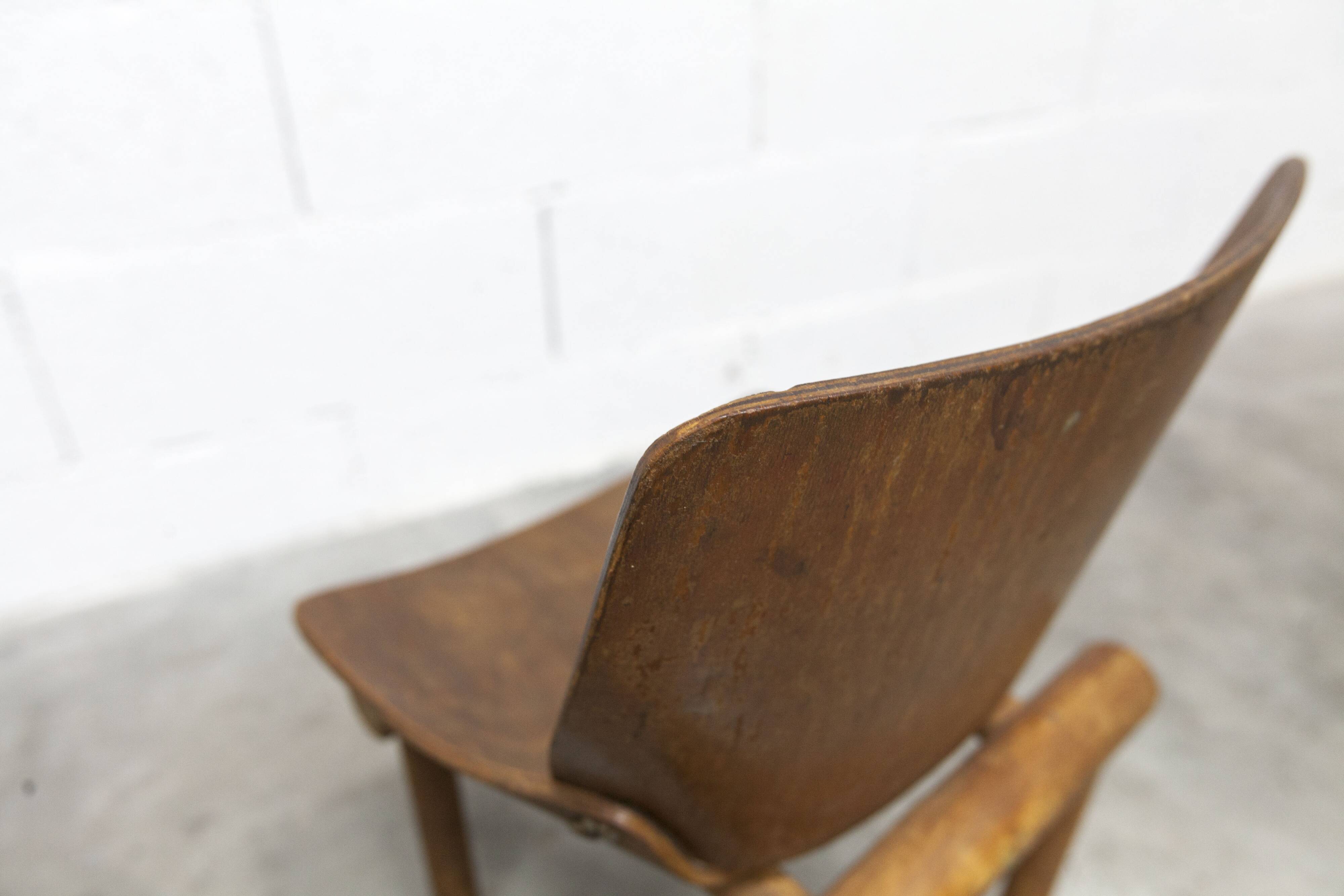 Atypical 1960s curved wood children's chair
