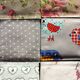 A set of 6 mismatched floral and bird-themed napkins
