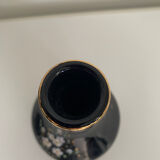 Black vase with flowers