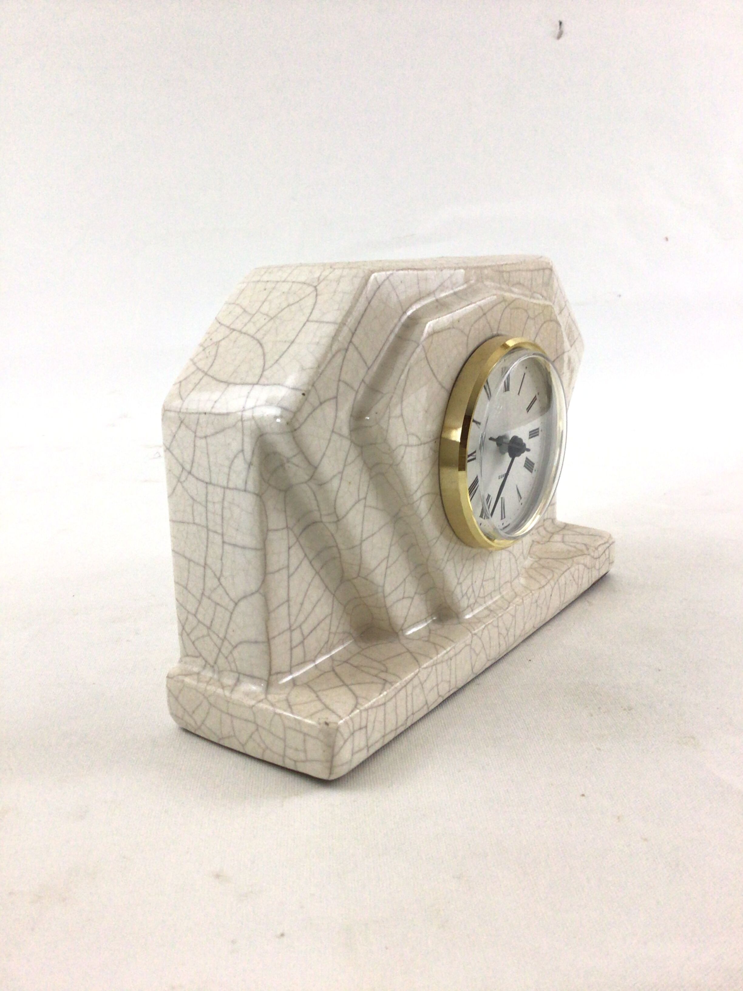 Clock Art deco in cracked earthenware