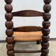 Pair of antique low fire chairs made of wood and straw