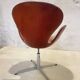 First edition Arne Jacobsen Swan chair, original patinated leather, 1950s