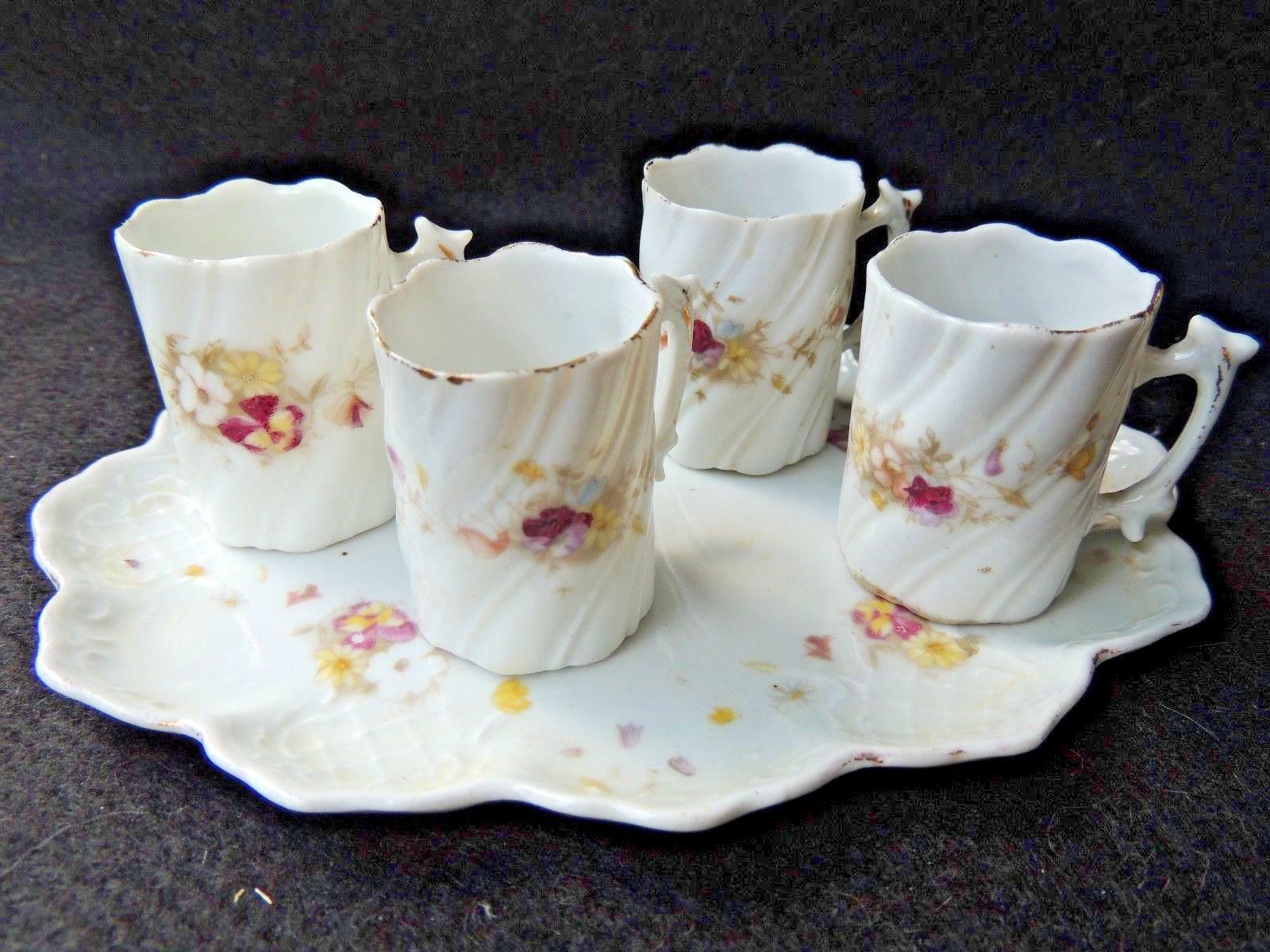 Tray and 4 small porcelain cups around 1900