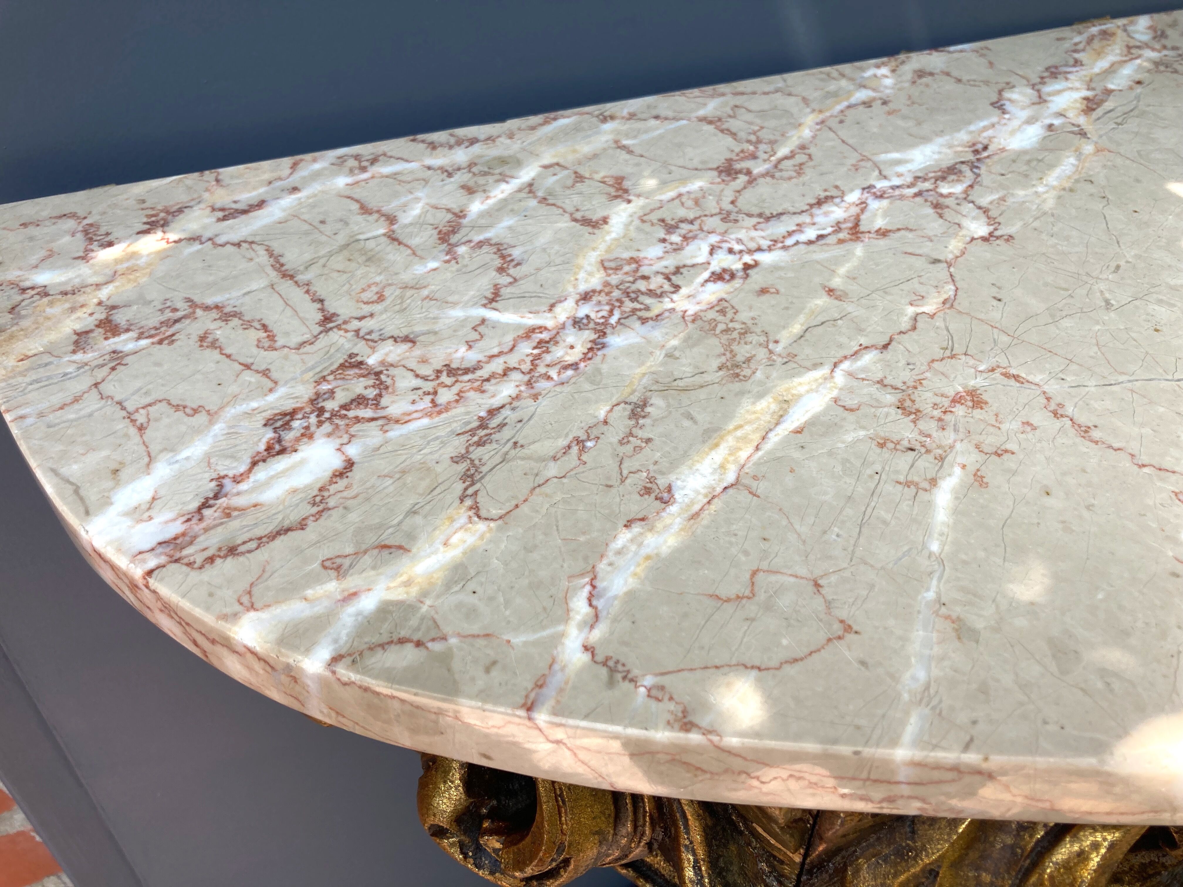 Carved wooden and marble console