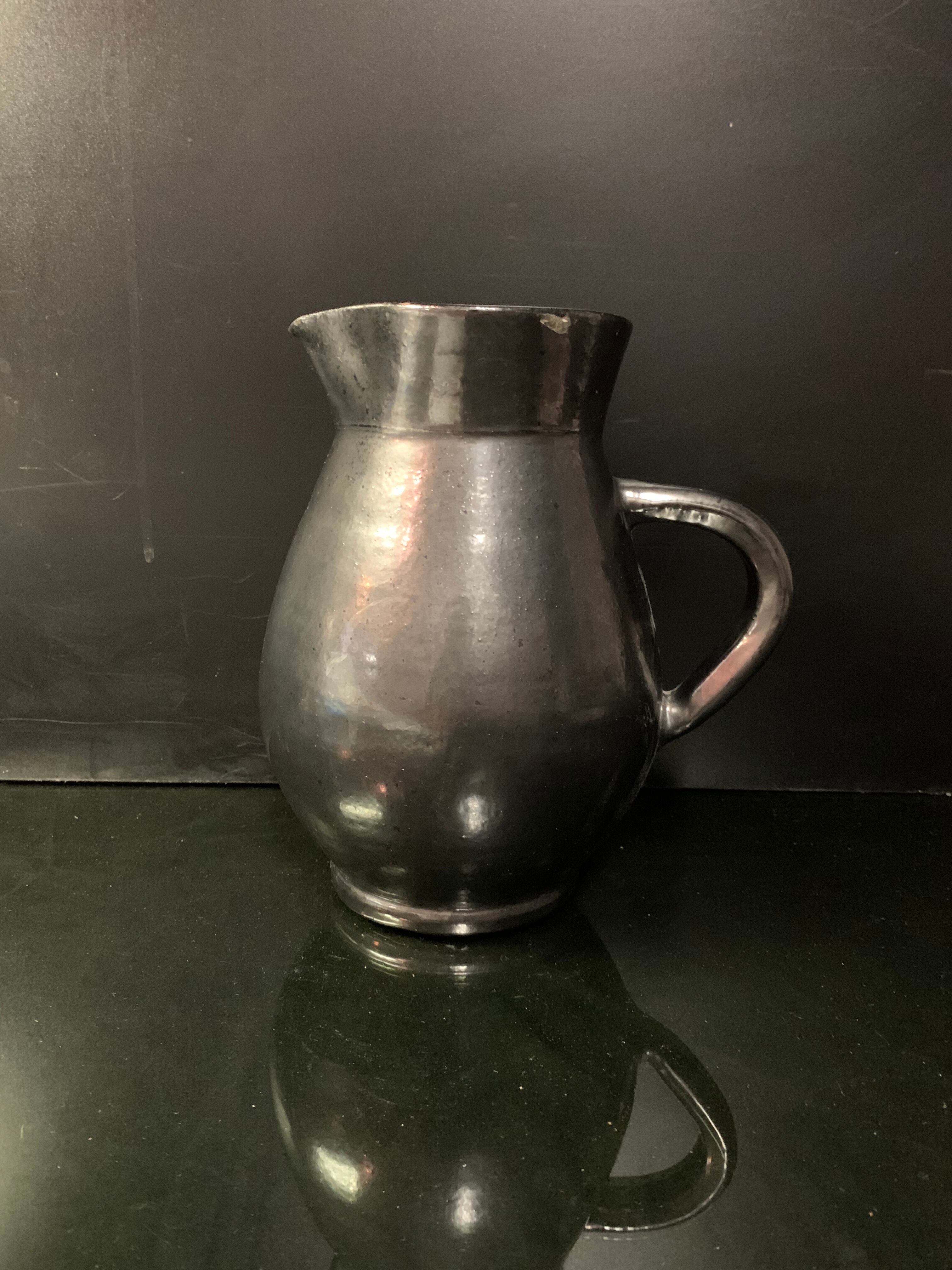 Black ceramic pitcher carafe design 1950