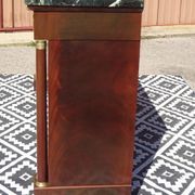 Flamed mahogany enfilade with sea green marble in Empire style.