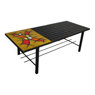 Coffee table made of metal, wood, and lava stone.