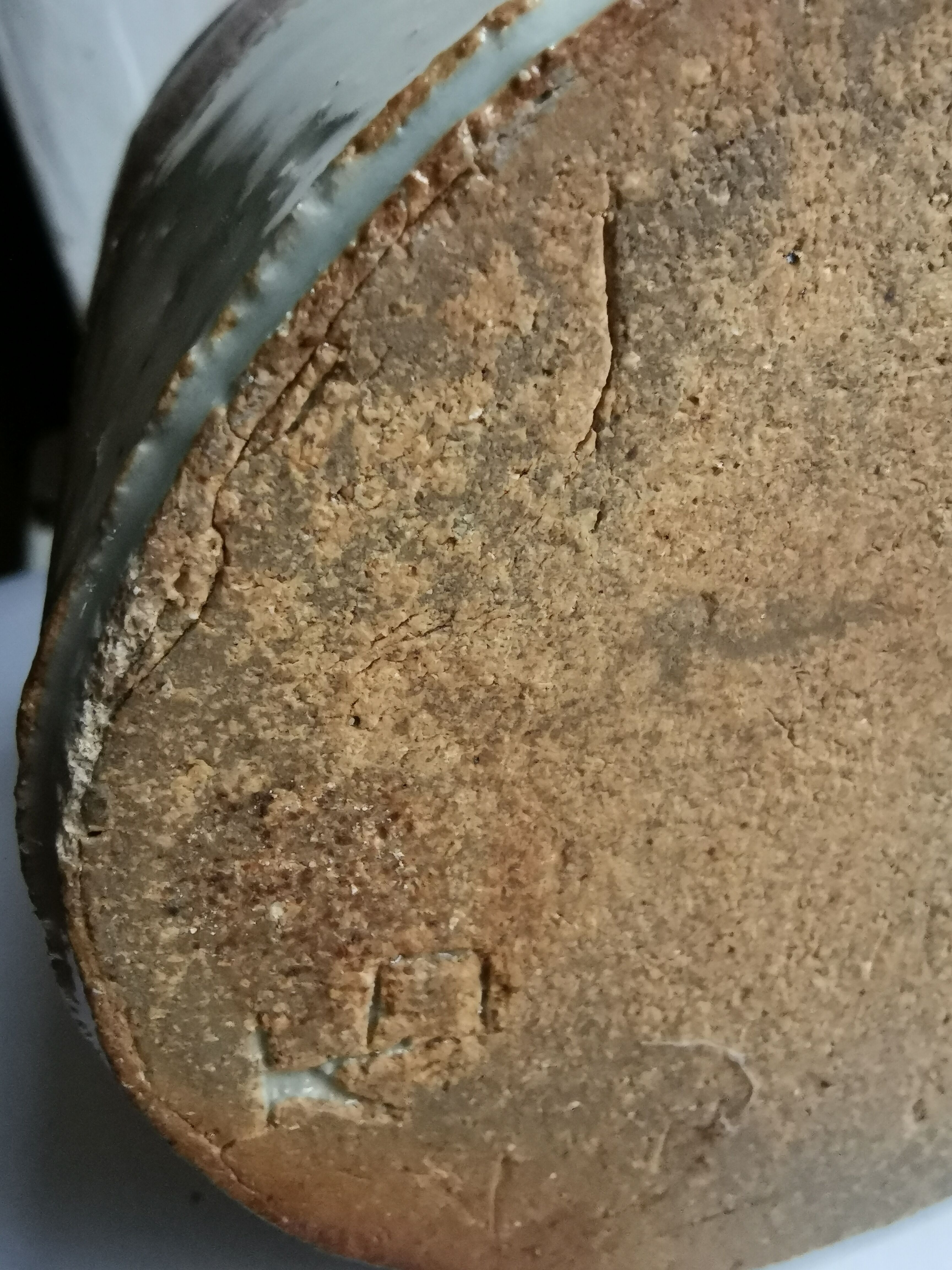 Vase in sandstone, free form, signed