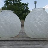 Art Deco ball vase pair with flower and leaf decor